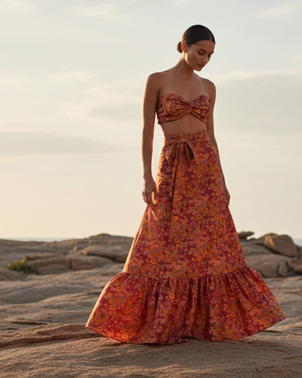 Woman in an Amaris flowy maxi dress, a perfect example of bohemian resort wear for vacation