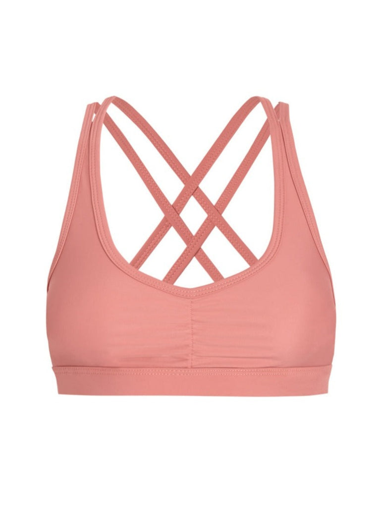 front of crossback sports bra in guava pink color