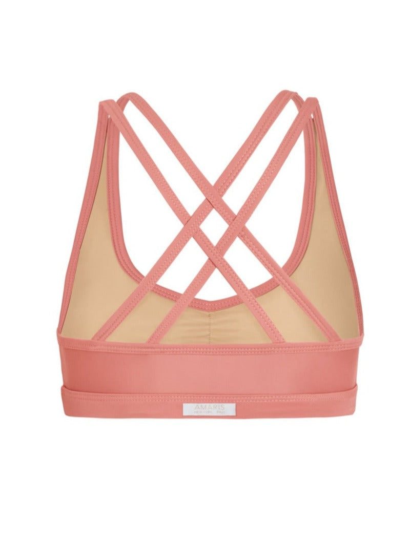 back of crossback sports bra in guava pink color